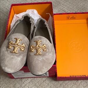 Tory Burch Taupe Suede Loafers with Gold Emblem 
Worn 2x, great condition